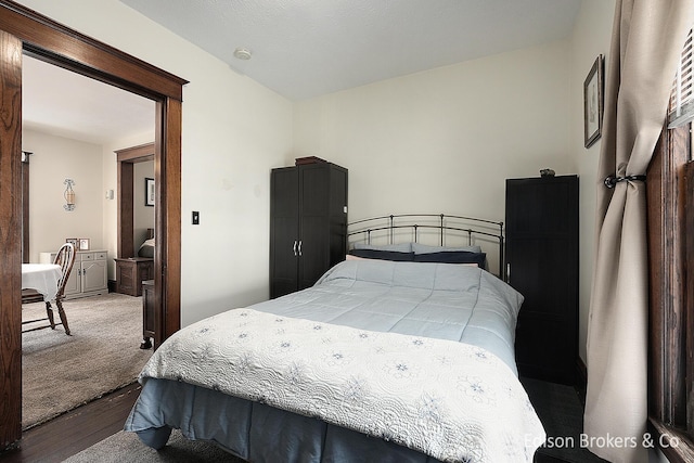 bedroom featuring hardwood / wood-style flooring