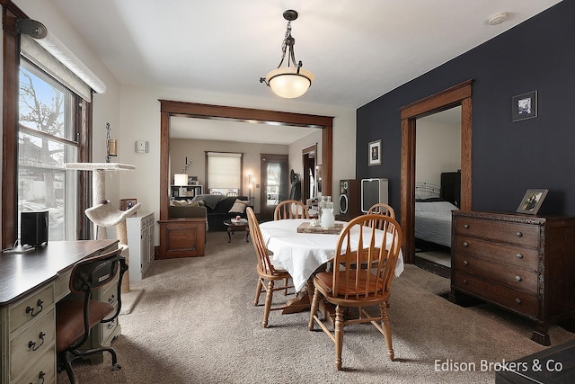 view of carpeted dining space