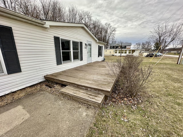 deck featuring a yard