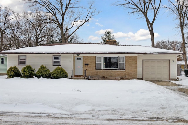 single story home with a garage