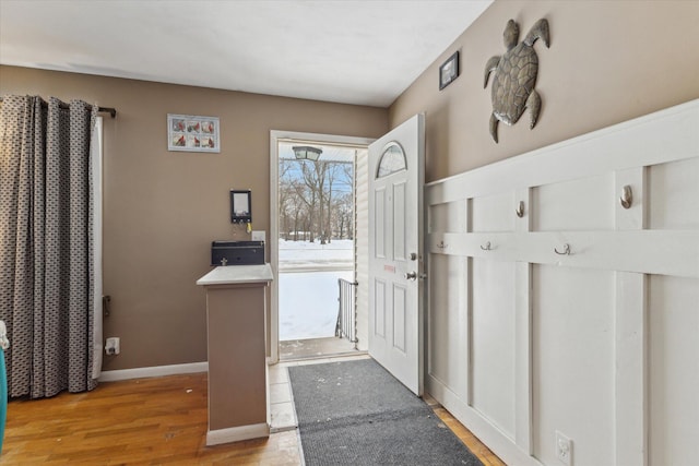 doorway with light hardwood / wood-style flooring