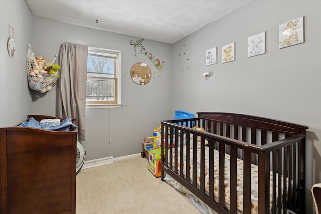 carpeted bedroom featuring a crib