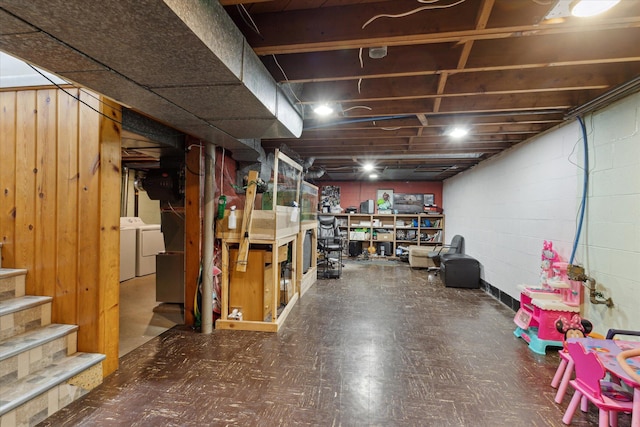 basement featuring washing machine and dryer