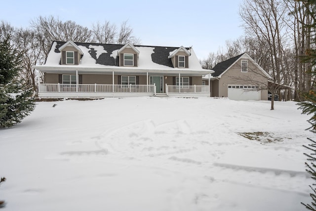 view of front of property with a garage and a porch