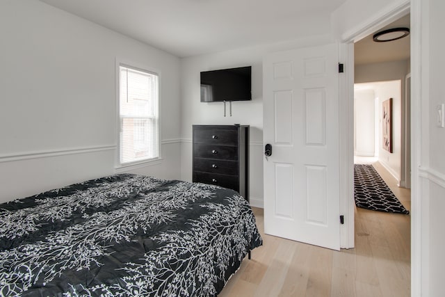 bedroom featuring wood-type flooring