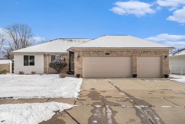 ranch-style home with a garage