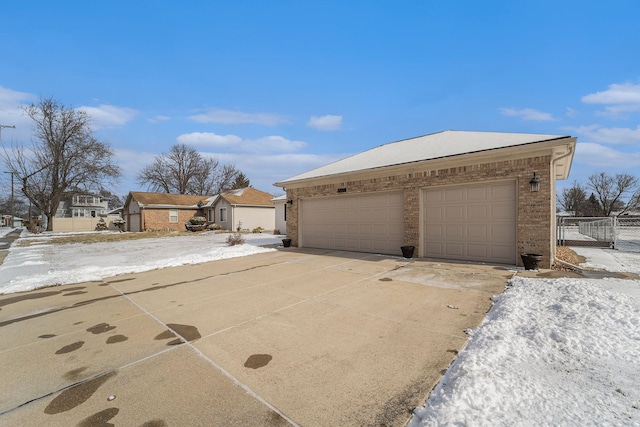 view of front of home with an outbuilding and a garage