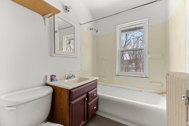 bathroom featuring vanity, radiator, and toilet