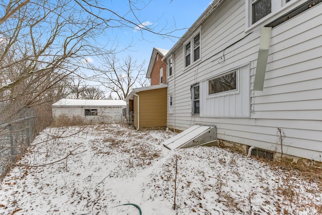 view of snow covered property