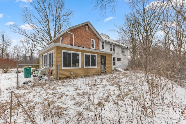 view of snow covered property