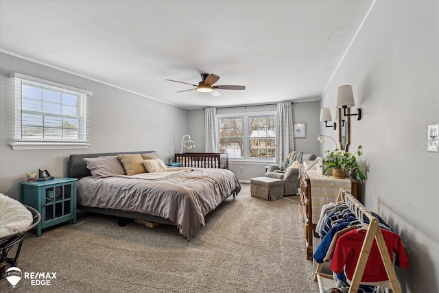 bedroom featuring ceiling fan and carpet floors