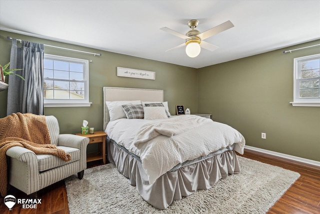 bedroom featuring dark wood-type flooring and ceiling fan