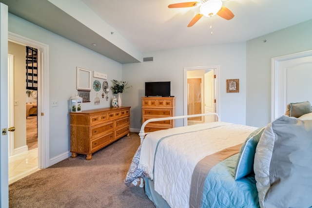 bedroom featuring ceiling fan and carpet floors