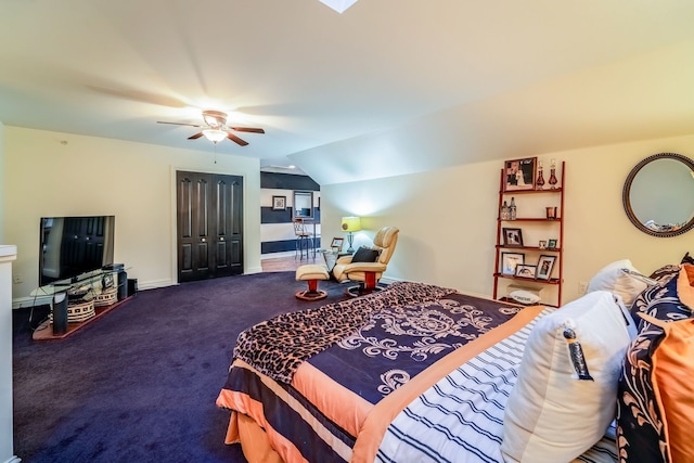 bedroom featuring ceiling fan, carpet, a closet, and lofted ceiling