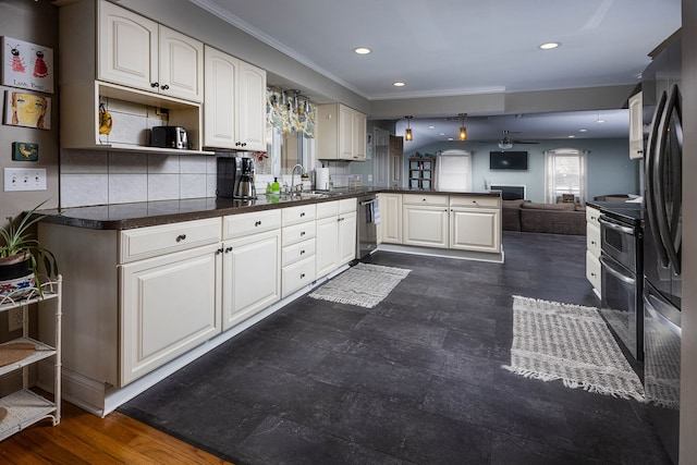 kitchen with white cabinetry, kitchen peninsula, sink, and tasteful backsplash