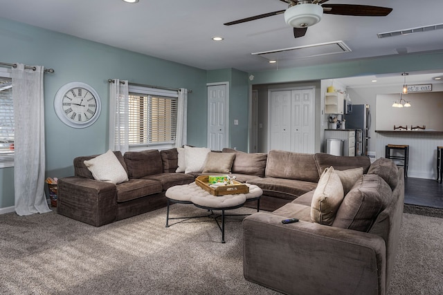 living room featuring ceiling fan