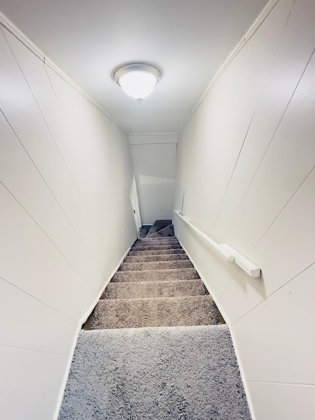 stairs featuring ornamental molding