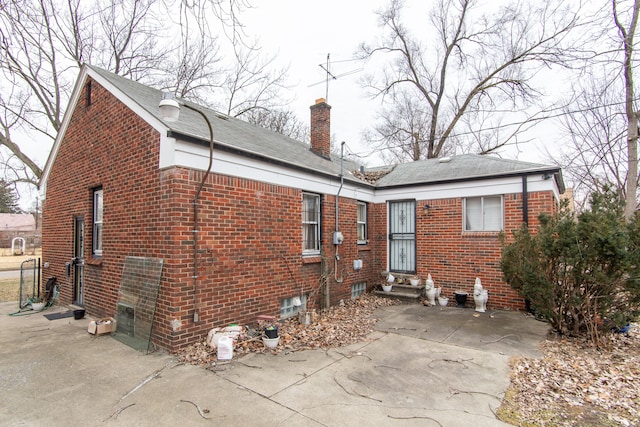 back of property with a patio area