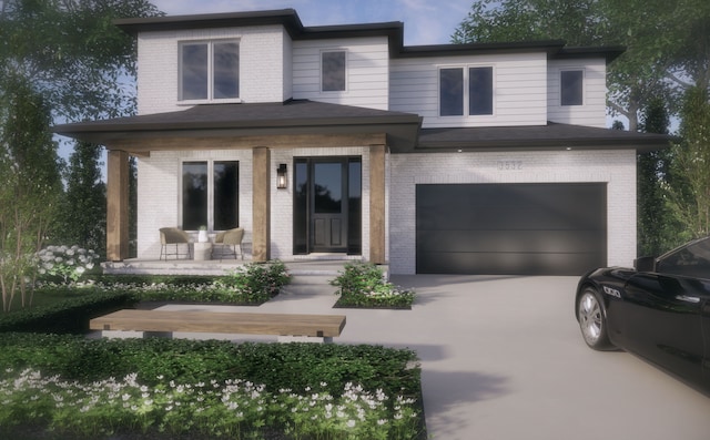 view of front of home with concrete driveway, brick siding, and a garage