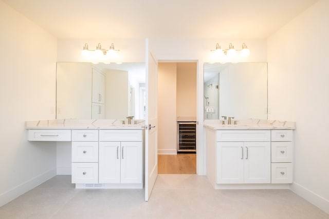 bathroom with vanity and beverage cooler