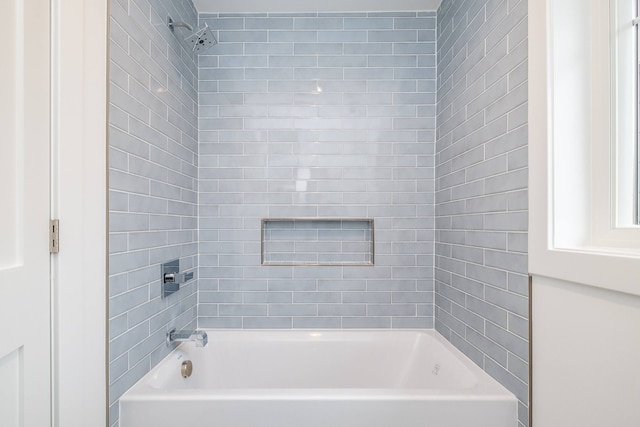 full bathroom featuring  shower combination
