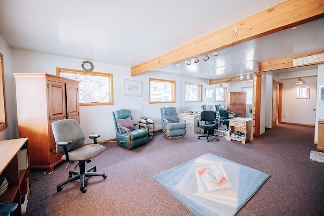 carpeted office space with beamed ceiling