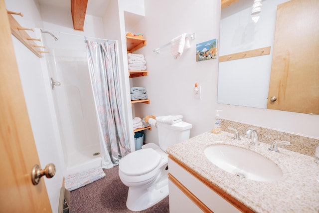 bathroom with vanity, toilet, and a shower with shower curtain