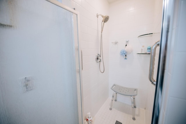 bathroom featuring walk in shower