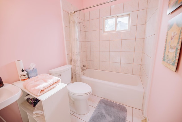 bathroom with toilet, tile patterned flooring, and shower / bath combo