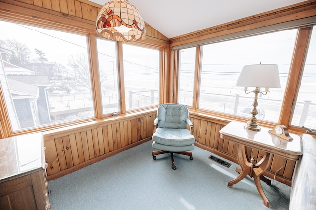 sunroom with vaulted ceiling