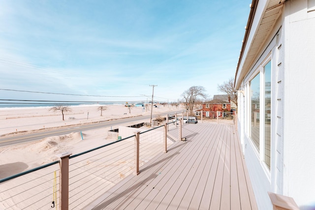 deck featuring a water view