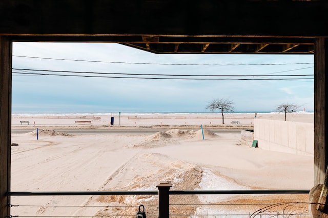 property view of water featuring a beach view