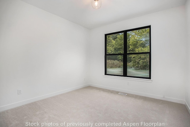 empty room with carpet floors