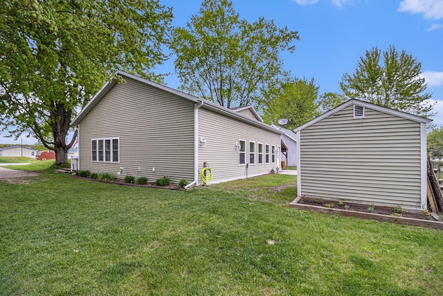 view of home's exterior with a yard