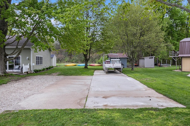 view of patio with a storage unit