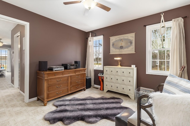 interior space featuring ceiling fan