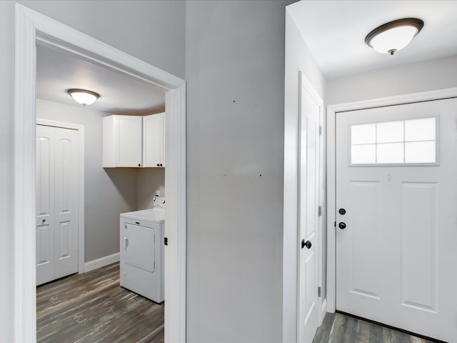 washroom with dark wood-type flooring and cabinets