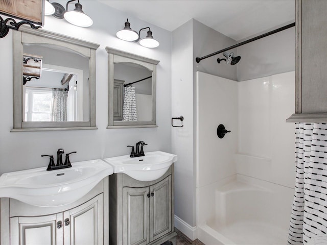 bathroom featuring vanity and a shower with curtain