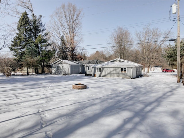 view of front facade with a fire pit