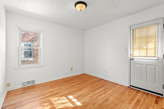 empty room featuring light hardwood / wood-style floors