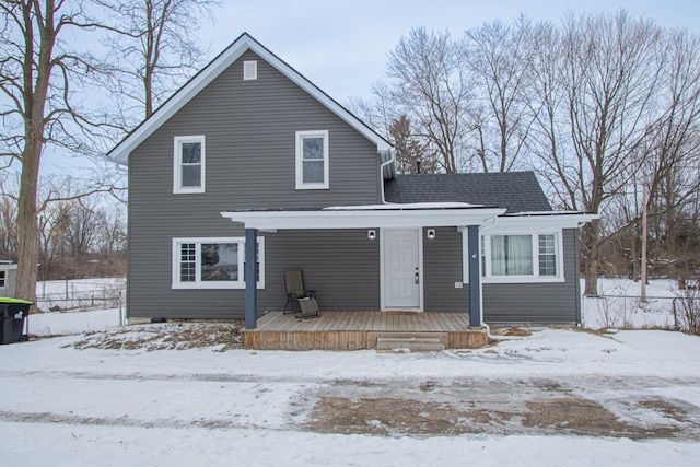 view of snow covered house