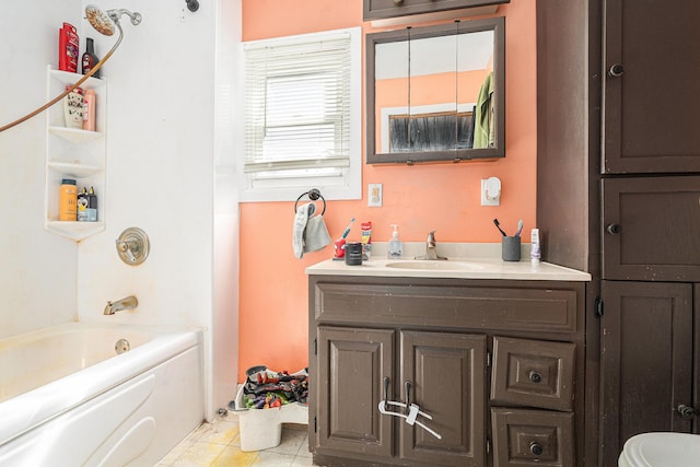 bathroom with tile patterned floors, shower / bath combination, and vanity