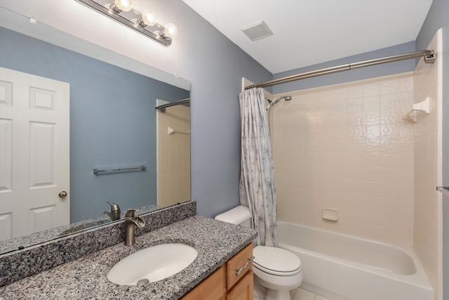 full bathroom with vanity, toilet, and shower / bath combo