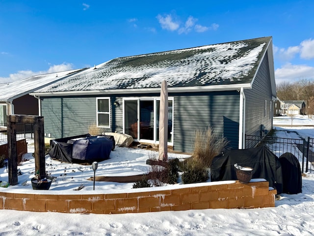 view of snow covered property