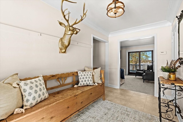 interior space featuring tile patterned flooring and crown molding