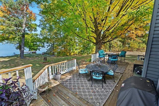 wooden deck with area for grilling