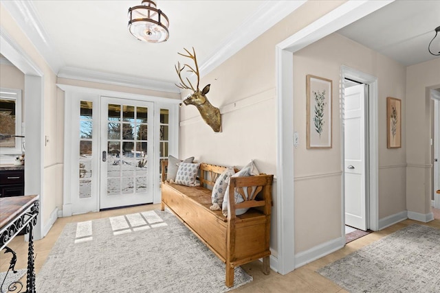 interior space featuring crown molding and light tile patterned flooring