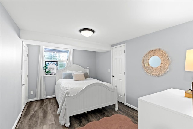 bedroom featuring dark wood-type flooring