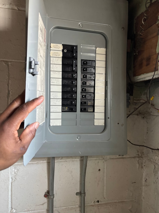 utility room featuring electric panel