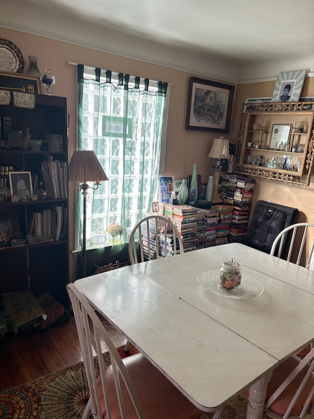 dining area featuring a wealth of natural light and wood finished floors